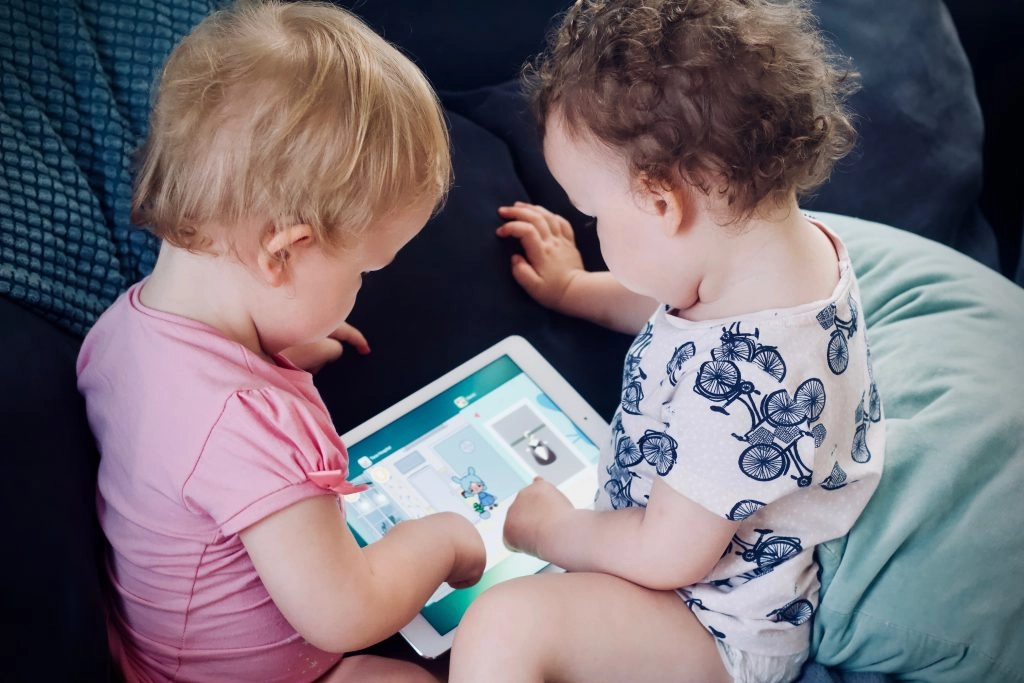 Children Playing with an iPad
