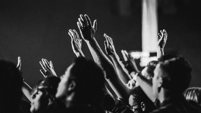 Hands Raised During a Worship Service