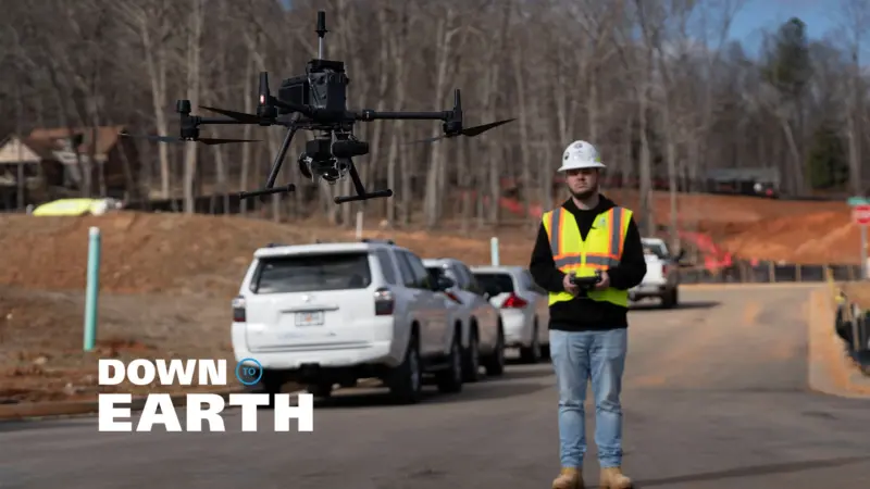 Nick King, UAS Pilot for LETEL, pilots the drone for a construction survey.